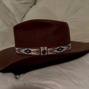 Brown Cowboy Hat with Aztec strap at base of hat. Women’s size medium.